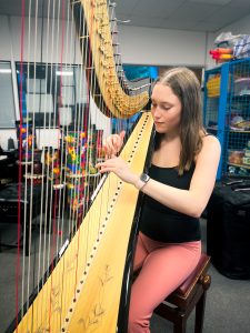 Harmony Valley-282 Lucie plays the harp